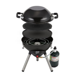 Black Coleman 4-1 Portable Propane Cooking System. Features three interchangeable cook top inserts (stove, wok and reversible griddle/grill). Removable legs and cook top inserts fit inside inverted wok for easy storage.