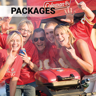 Group of fans tailgating with red Coleman RoadTrip grill and red Coleman shelter